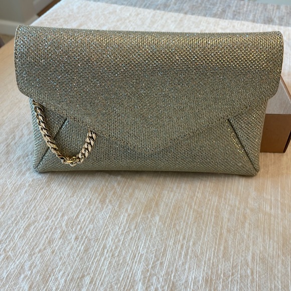 STUART WEITZMAN
The Loveletter Mini Metallic Clutch Bag - Picture 7 of 11